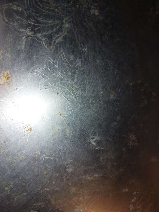 A VINTAGE STAINLESS STEEL SERVING TRAY NEEDS POLISHING