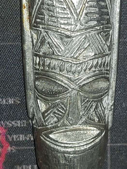 Two art bottle openers