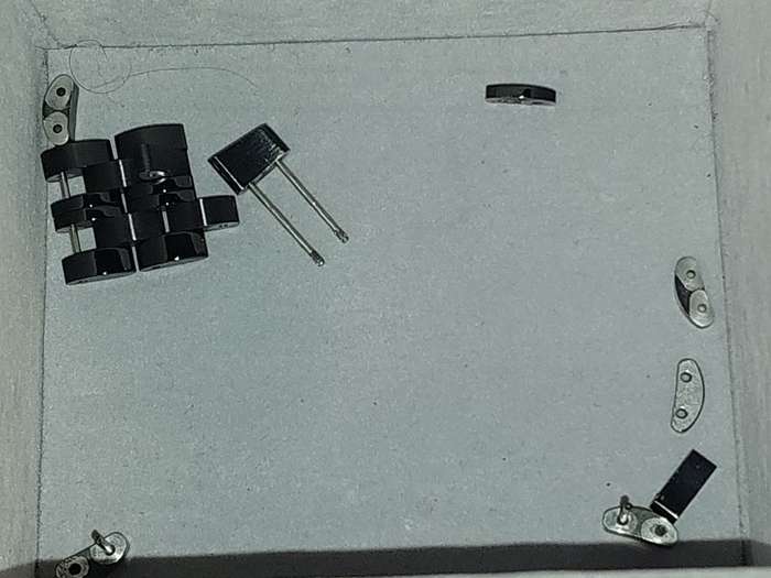 A MENS POLICE RECTANGULAR BLACK ENAMEL WRISTWATCH