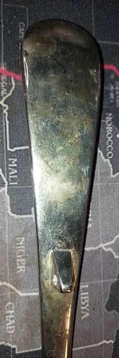 A SOLID SILVER PLATED SOUP LADLE APPROXIMATELY 33 CENTIMETERS IN LENGTH
