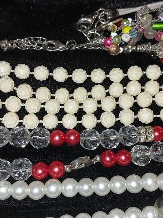 A COLLECTION OF COSTUME NECKLACES SOLD AS IS