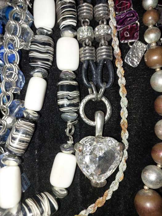 A VINTAGE COLLECTION DESIGNER COSTUME NECKLACES SOLD AS IS