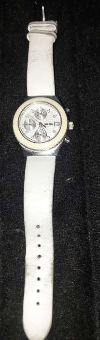 A FOLLI FOLLIE WITH WHITE ENEMAL BAZEL D/D AND WHITE LEATHER BAND
