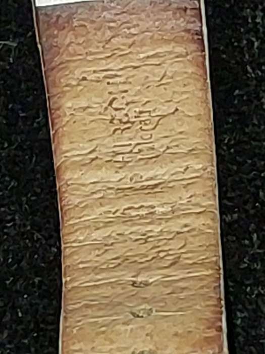 A FOLLI FOLLIE WITH WHITE ENEMAL BAZEL D/D AND WHITE LEATHER BAND