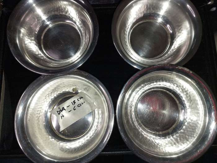 A SET OF 4 SILVER-PLATED ON BRONZE SERVING BOWLS MADE IN SWEDEN