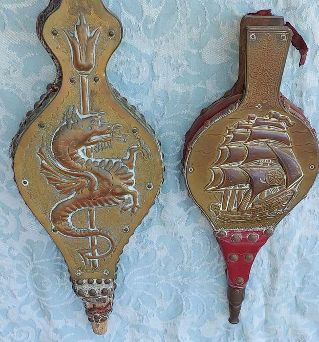 TWO ORNATELY DESIGNED WITH BRASS PLAQUES FIRE BLOWERS