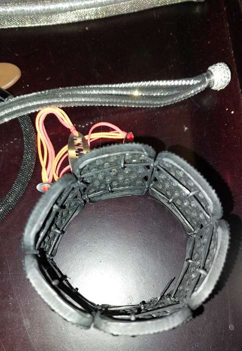 A COLLECTION OF COSTUME FASHION MAGNETIC BRACELET BANDS