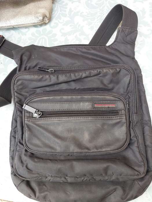 A COLLECTION OF KIPLING AND GABS HAND BAGS SOLD AS IS