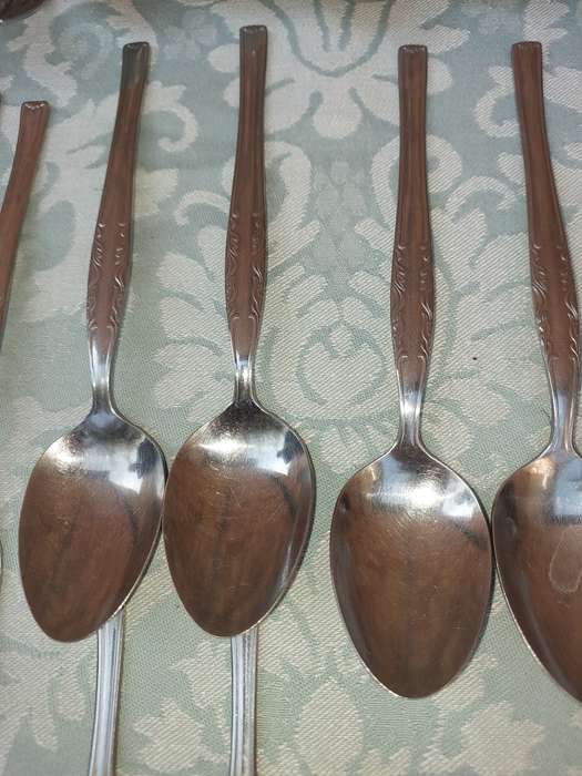 A 34-PIECE ALFA STAINLESS STEEL CUTLERY SET
