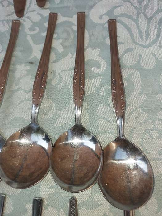 A 34-PIECE ALFA STAINLESS STEEL CUTLERY SET