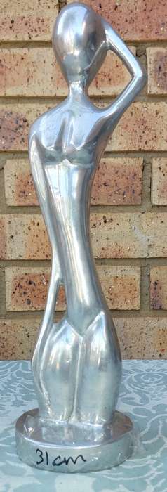 An art decor figurine naked lady 31 centimetres in height