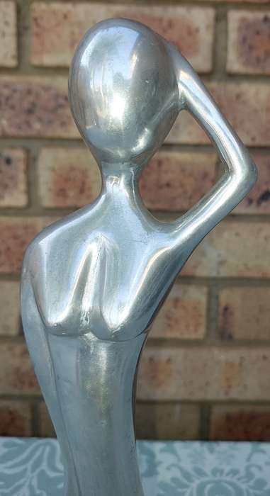 An art decor figurine naked lady 31 centimetres in height