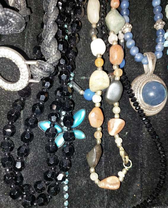 A COLLECTION OF DESIGNER COSTUME NECKLACES USED SOLD AS IS