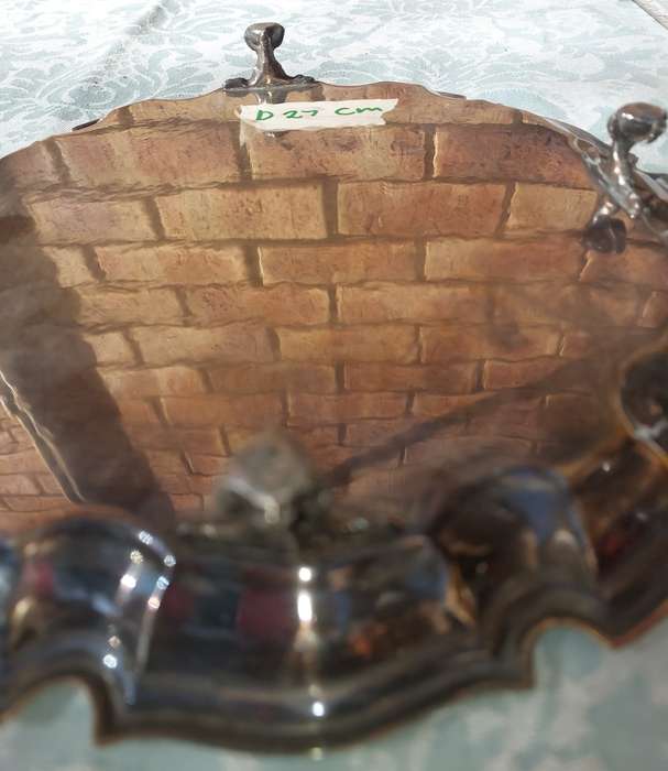 A 27 CENTIMETER DIAMETER VICTORIAN EPNS SERVING TRAY