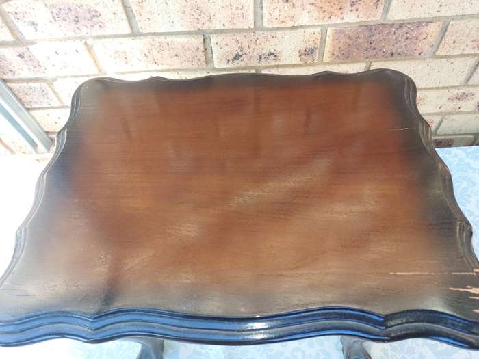 AN ANTIQUE RECTANGULAR SOLID WOOD BALL N CLAW LEGGED OCCASIONAL TABLE