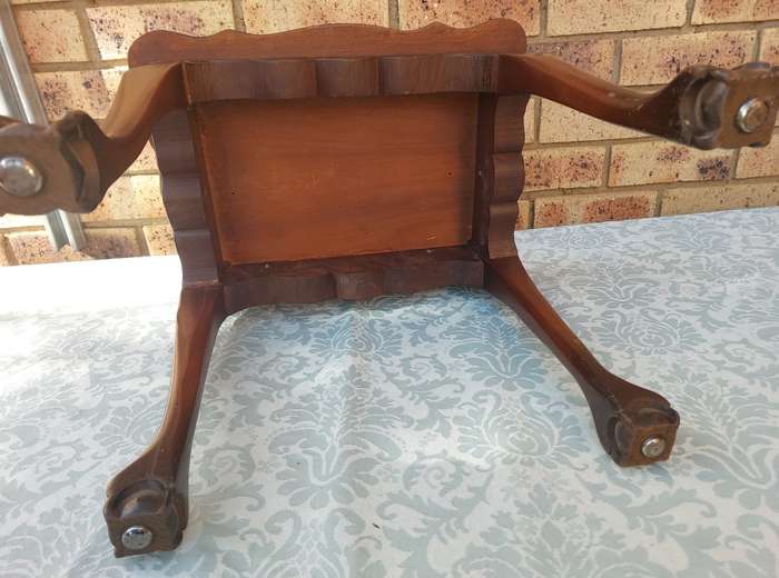 AN ANTIQUE RECTANGULAR SOLID WOOD BALL N CLAW LEGGED OCCASIONAL TABLE