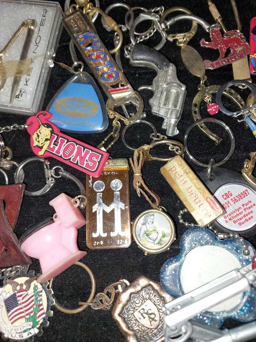 A BULK VINTAGE COLLECTION KEY RINGS SOLD AS IS