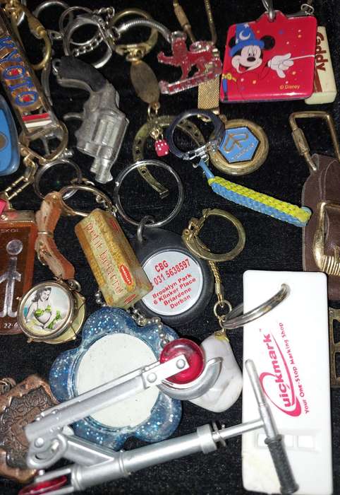 A BULK VINTAGE COLLECTION KEY RINGS SOLD AS IS