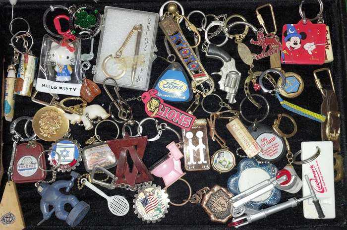A BULK VINTAGE COLLECTION KEY RINGS SOLD AS IS