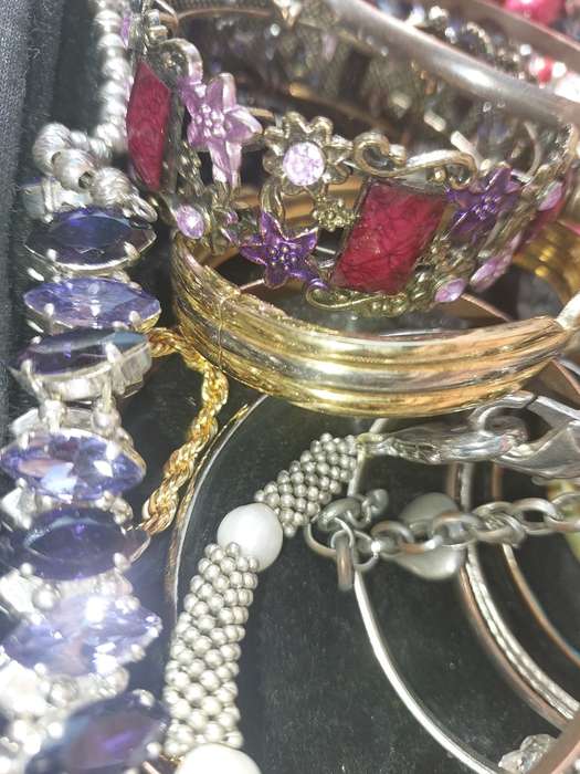 A VINTAGE USED JOB LOT COLLECTION BRACELETS AND BANGLES