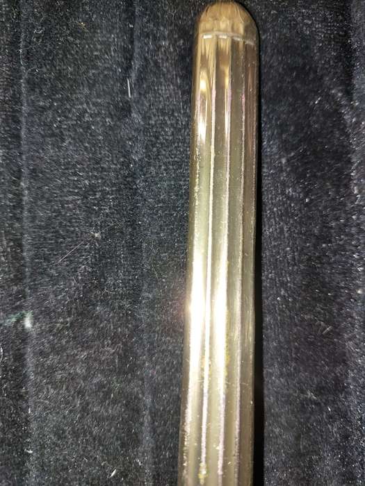 AN ANTIQUE COLLECTION EDWARDIAN BRASS GOLD PLATED HAIR BRUSHES