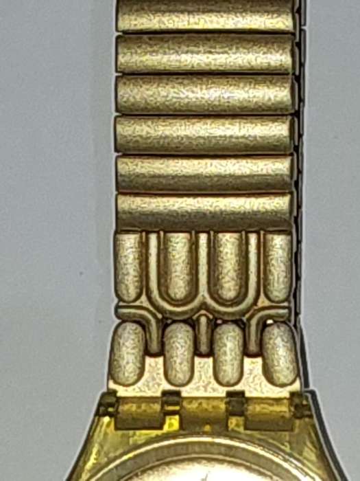 A VINTAGE SWATCH DATE GOLDPLATED 9003