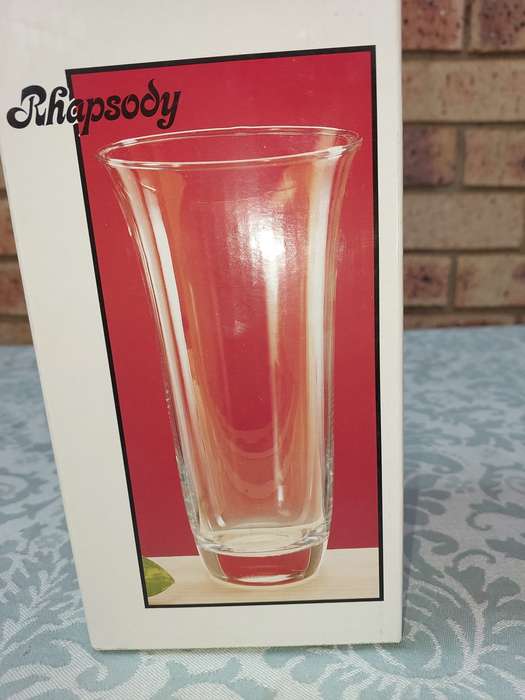 A RHAPSODY GLASS VASE SOLD AS IS