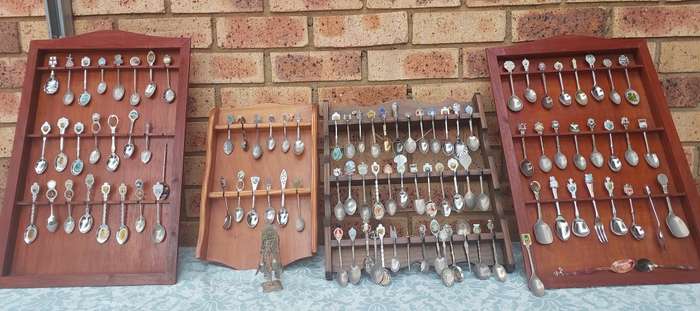 AN ENTIRE COLLECTION OF 108 MEMORABILIA SPOONS AND CABINETS