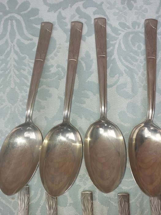 AN ANTIQUE BELVIN NICKEL SILVER CUTLERY SET