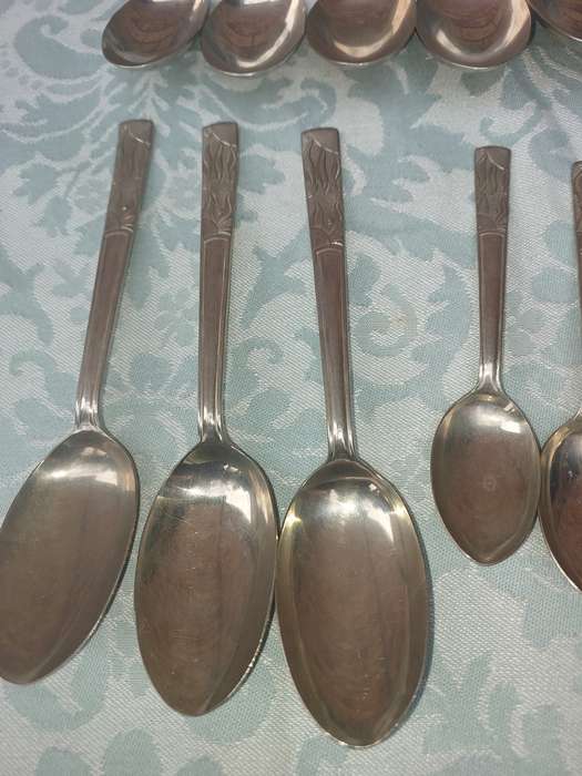 AN ANTIQUE BELVIN NICKEL SILVER CUTLERY SET