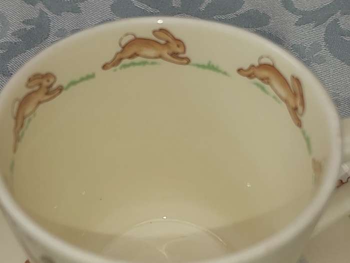 A RARE ROYAL DOULTON BUNNYKINS TEA CUP AND SAUCER