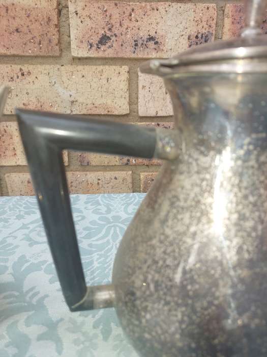 TWO VINTAGE TEA JUGS SOLD