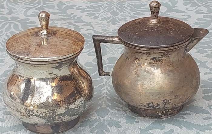 A SET OF TWO UNITY SP ON C MILK JUG AND SUGAR JAR