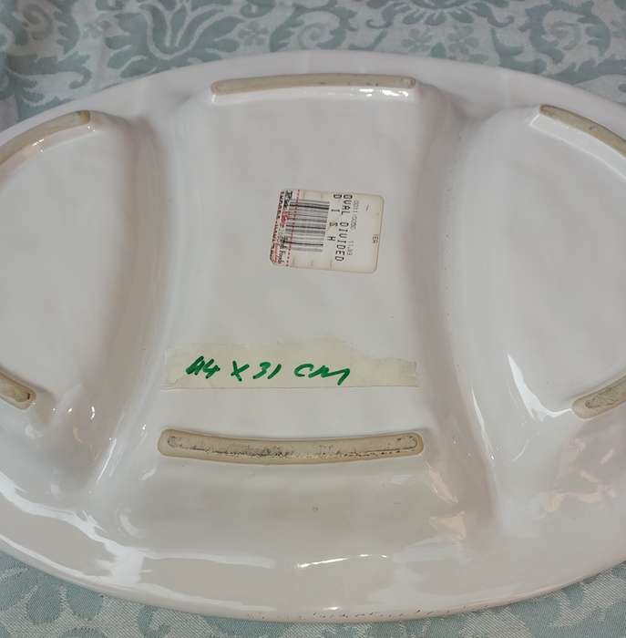 AN OVAL DIVIDED DISH PORCELAIN CERAMIC