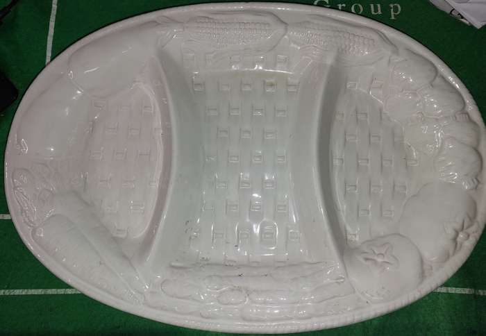 AN OVAL DIVIDED DISH PORCELAIN CERAMIC