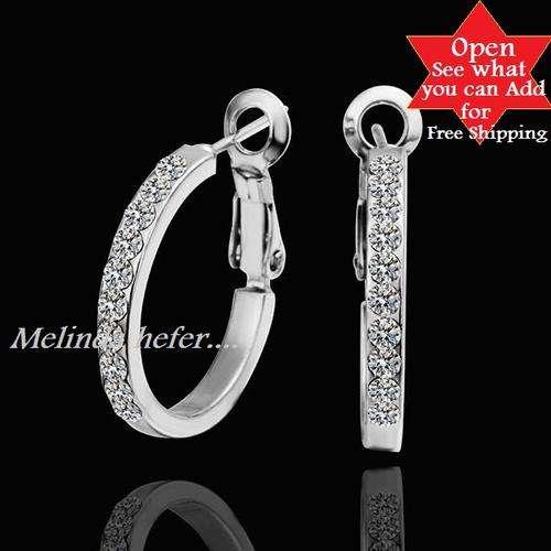 THIS IS A ABSOLUTELY BEAUTIFUL ITEM! IMPRESSIVE EARRINGS, SWAROVSKI ELEMENTS - MUST BID!!!