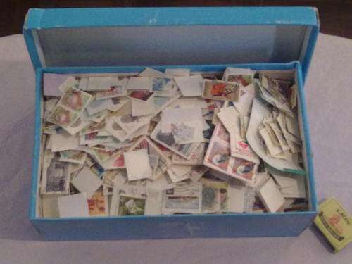 SHOE BOX WITH THOUSANDS OF S.A & WORLD ON AND OFF PAPER