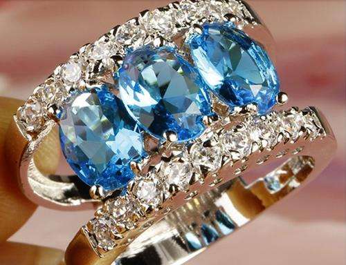 SAPPHIRE  CZ SET IN .925 STERLING SILVER RING