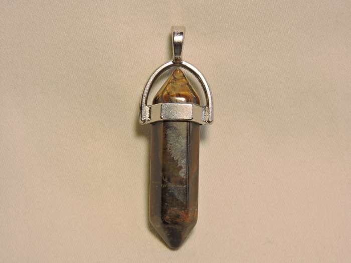 Contemporary Tyger`s Eye pendant ( crystal cut golden brown stone pendant).