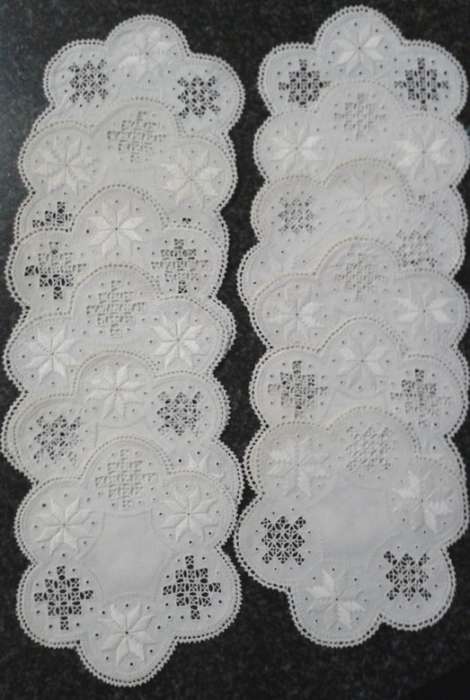 Two dozen round vintage linen Lefkara lace doilies/table mats