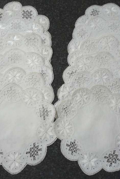 Two dozen round vintage linen Lefkara lace doilies/table mats