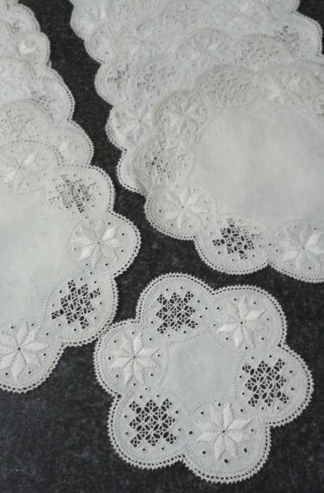 Two dozen round vintage linen Lefkara lace doilies/table mats