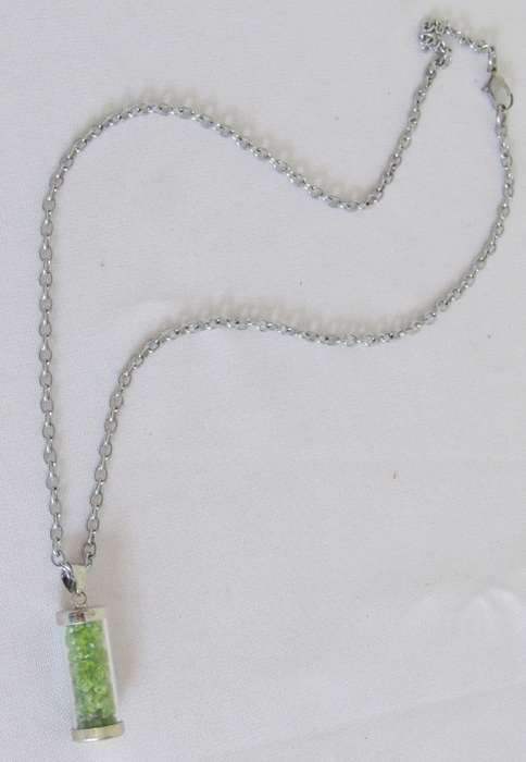 Vintage silver tone chain with tube pendant filled with jade chips