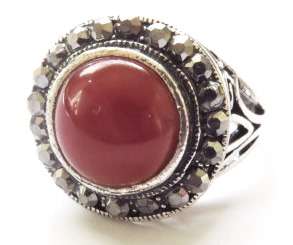 Antique silver tone fashion ring with smooth round red stone