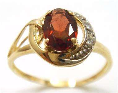 STUNNING 9CT SOLID YELLOW GOLD GARNET AND DIAMOND RING (INVEST NOW IN GOLD JEWELLERY)