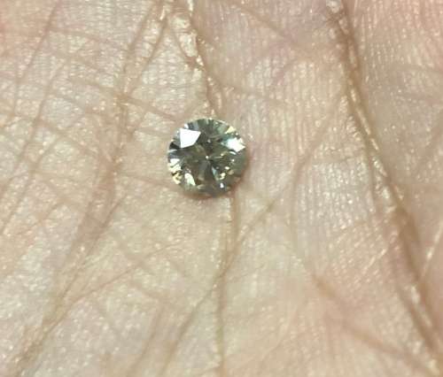 **IGL CERTIFIED R17766**0.55CT ENHANCED NATURAL RARE FANCY LIGHT BROWN ROUND CUT DIAMOND VS2