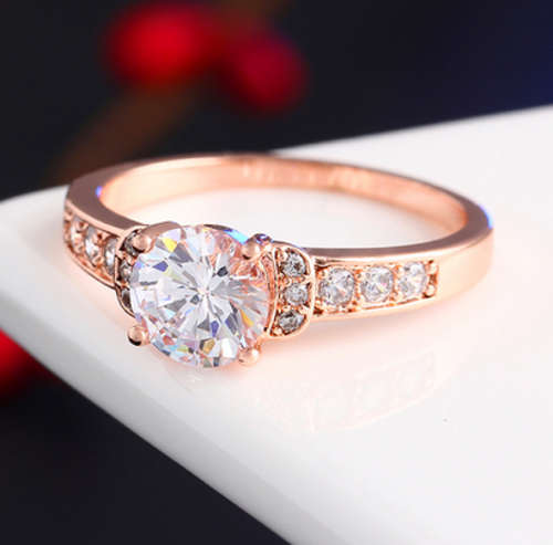 AN ABSOLUTE BEAUTY!! ROSE GOLD PLATED SIMULATED DIAMOND RING SIZE 7/17.3MM/O