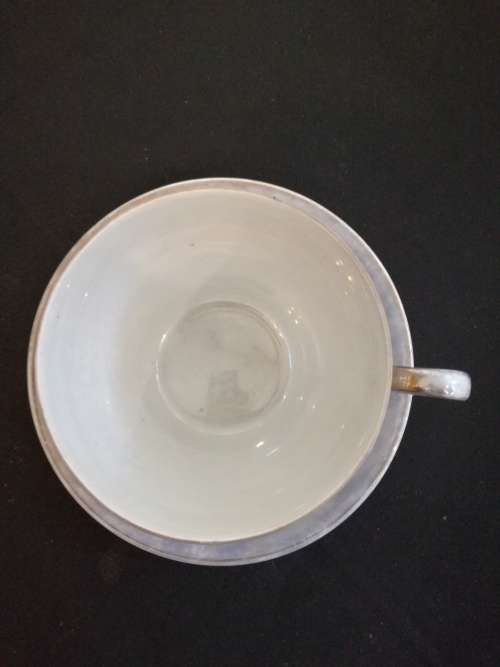 Over-sized Lustreware teacup and saucer