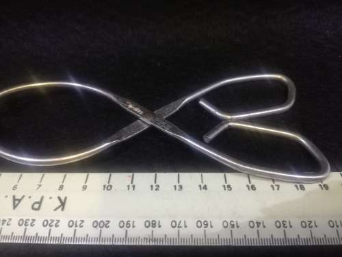 Vintage skyline tongs made in England, stainless steel