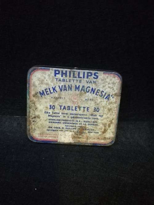 Vintage Phillips melk van magnesia tablette tin - AFRIKAANS een kant Engels anderkant